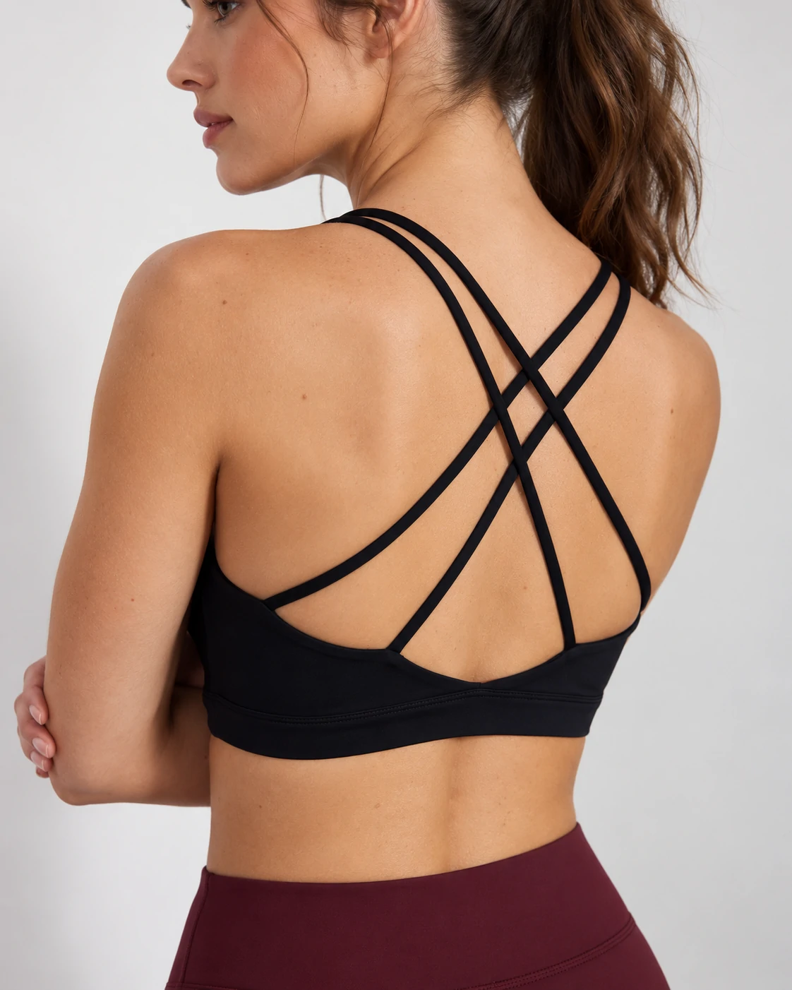 Custom strappy yoga sports bra manufacturer